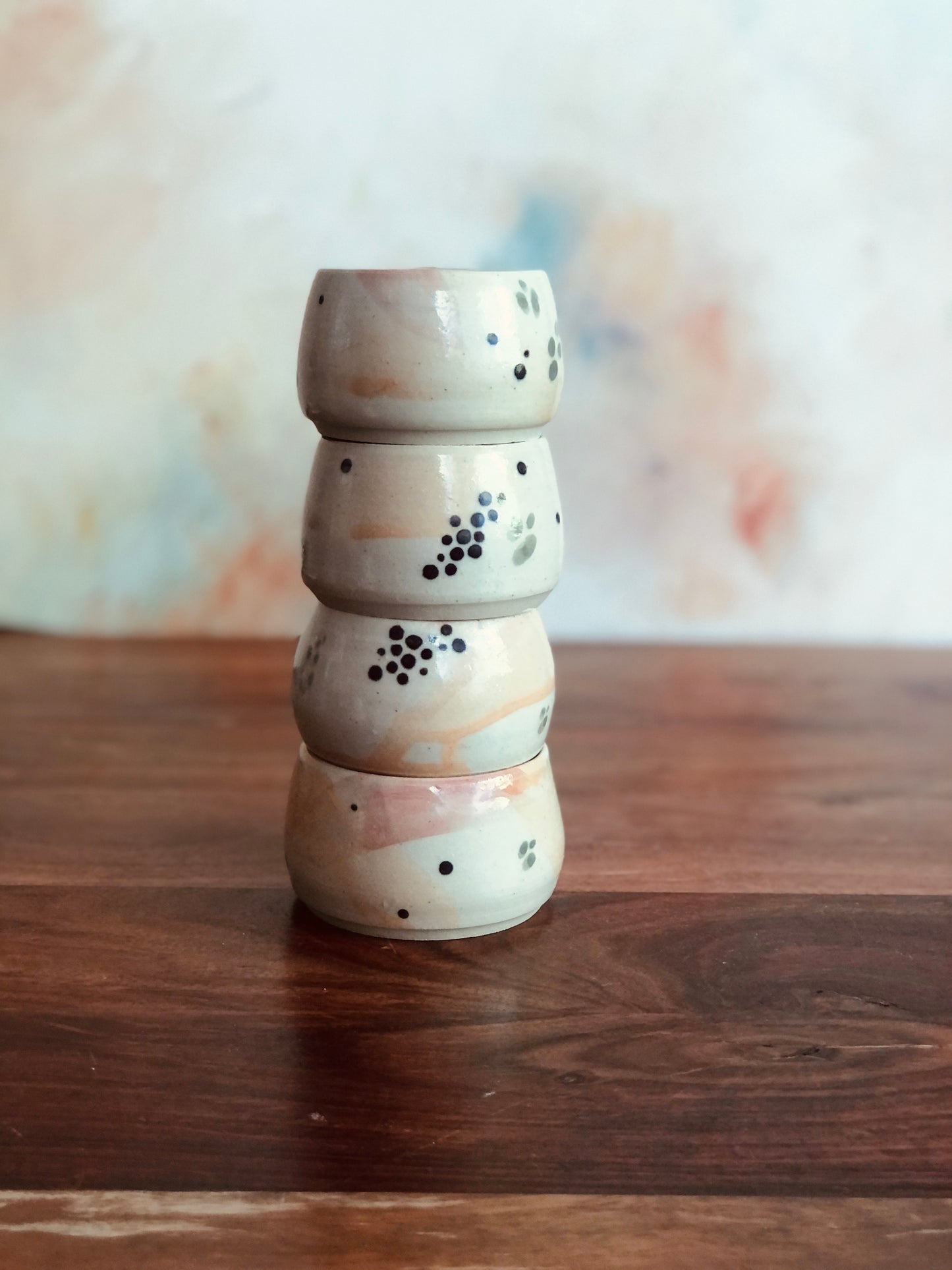 Tiny painted cup or bowl (candle optional)