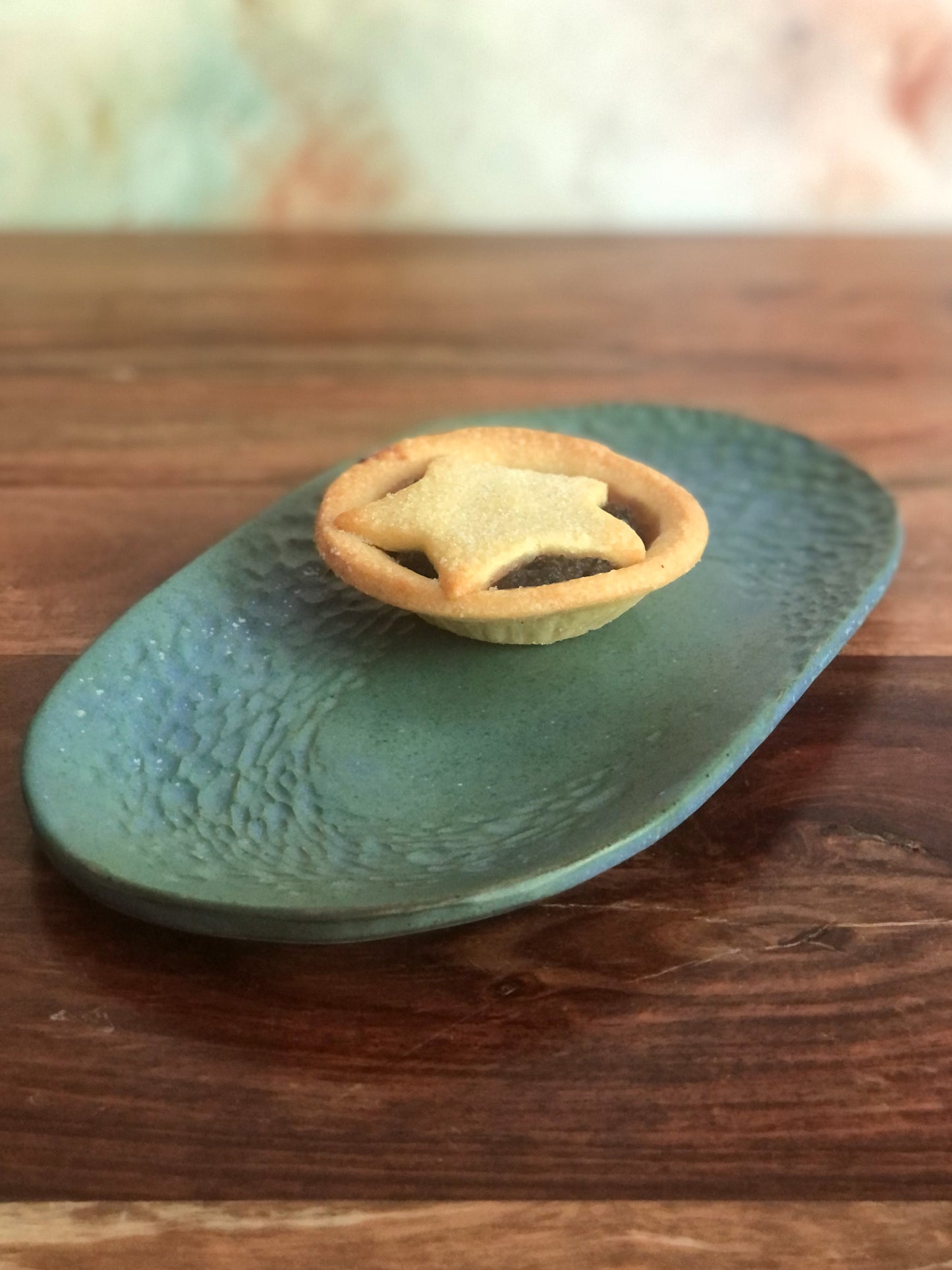 Small carved green oval plate