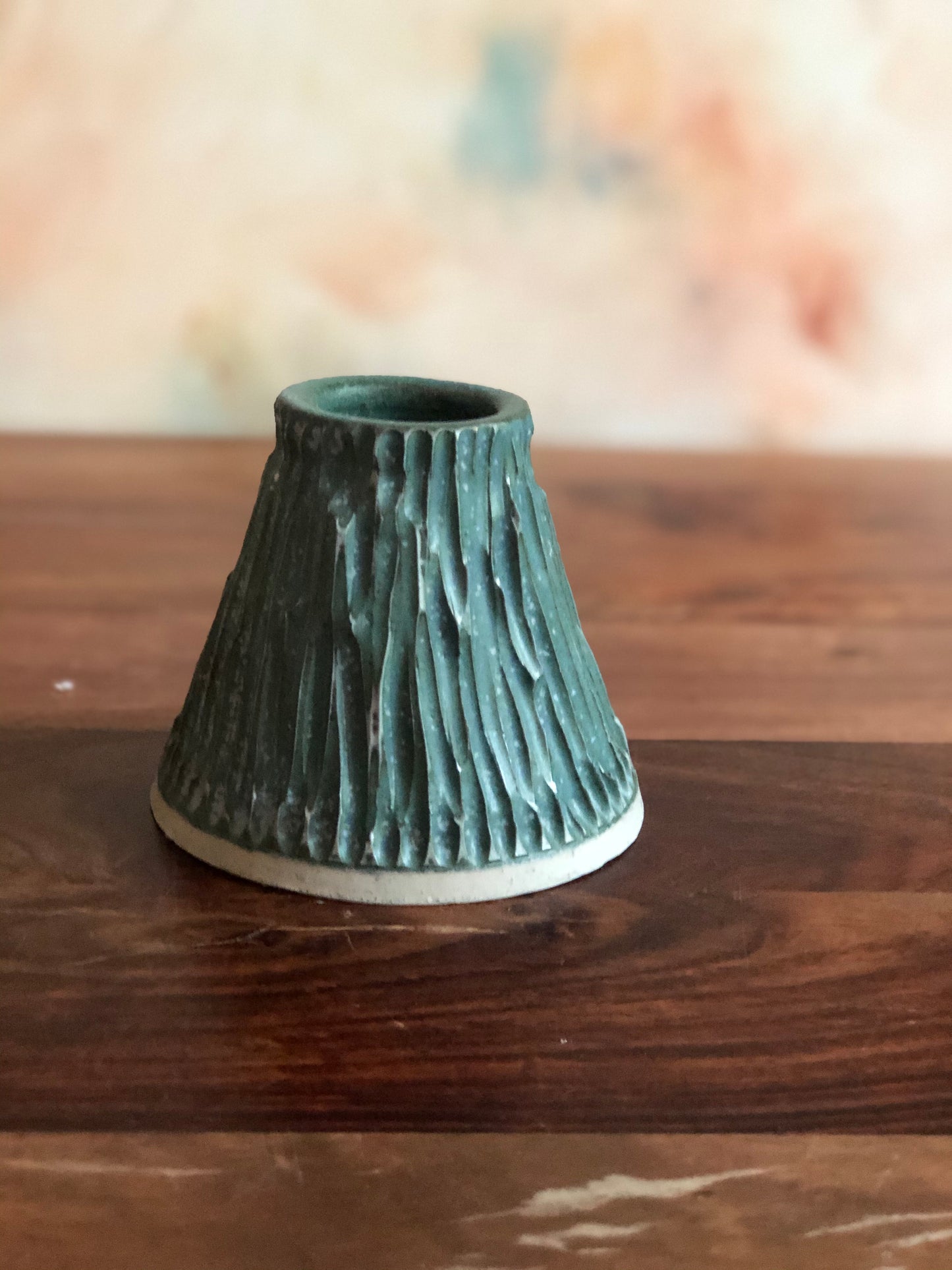 Carved volcano vase