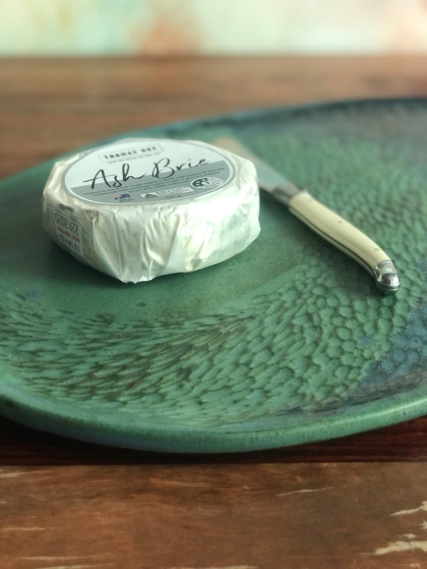 Carved green and blue oval platter