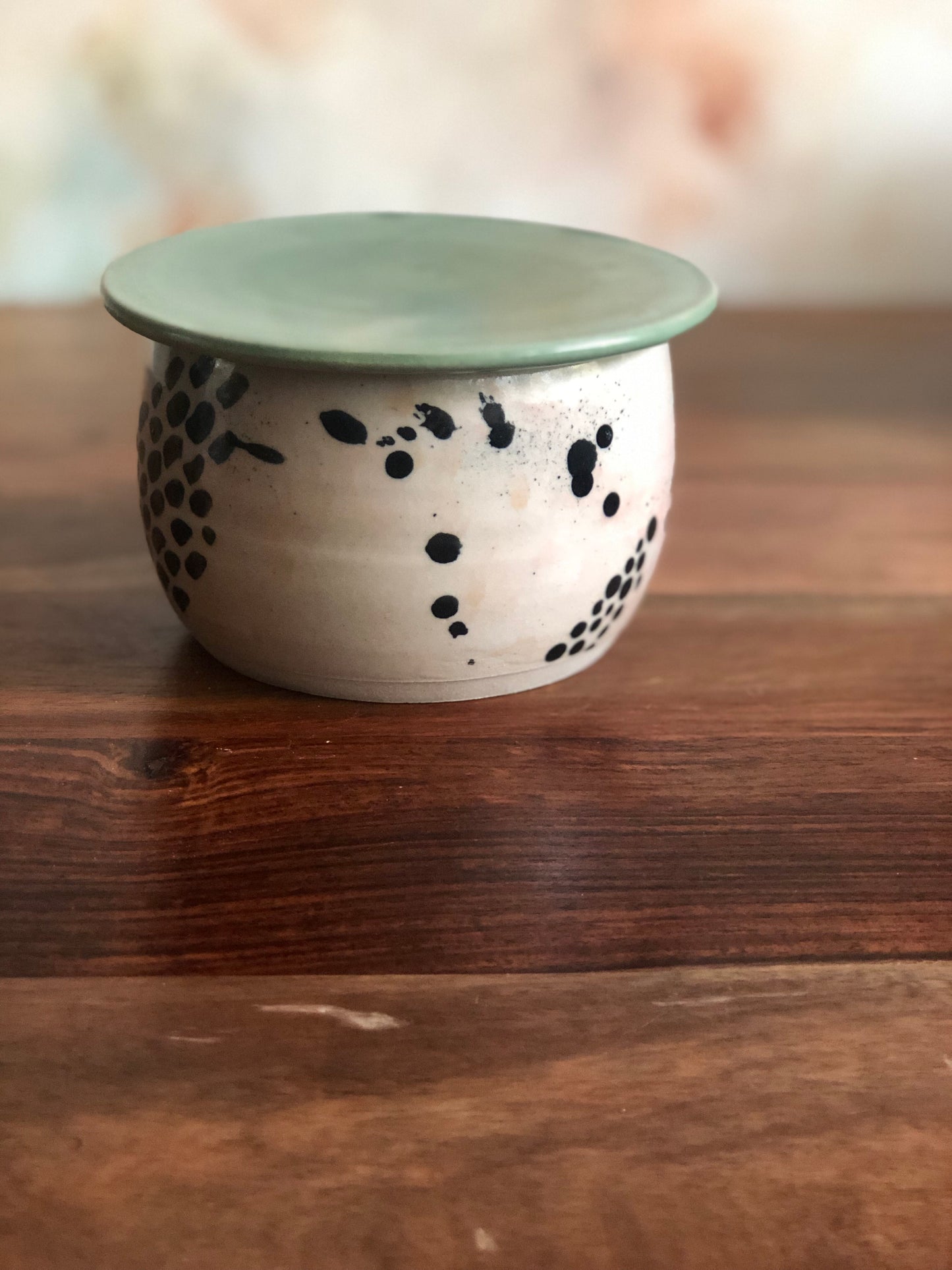 Hand-painted French butter keeper with green lid