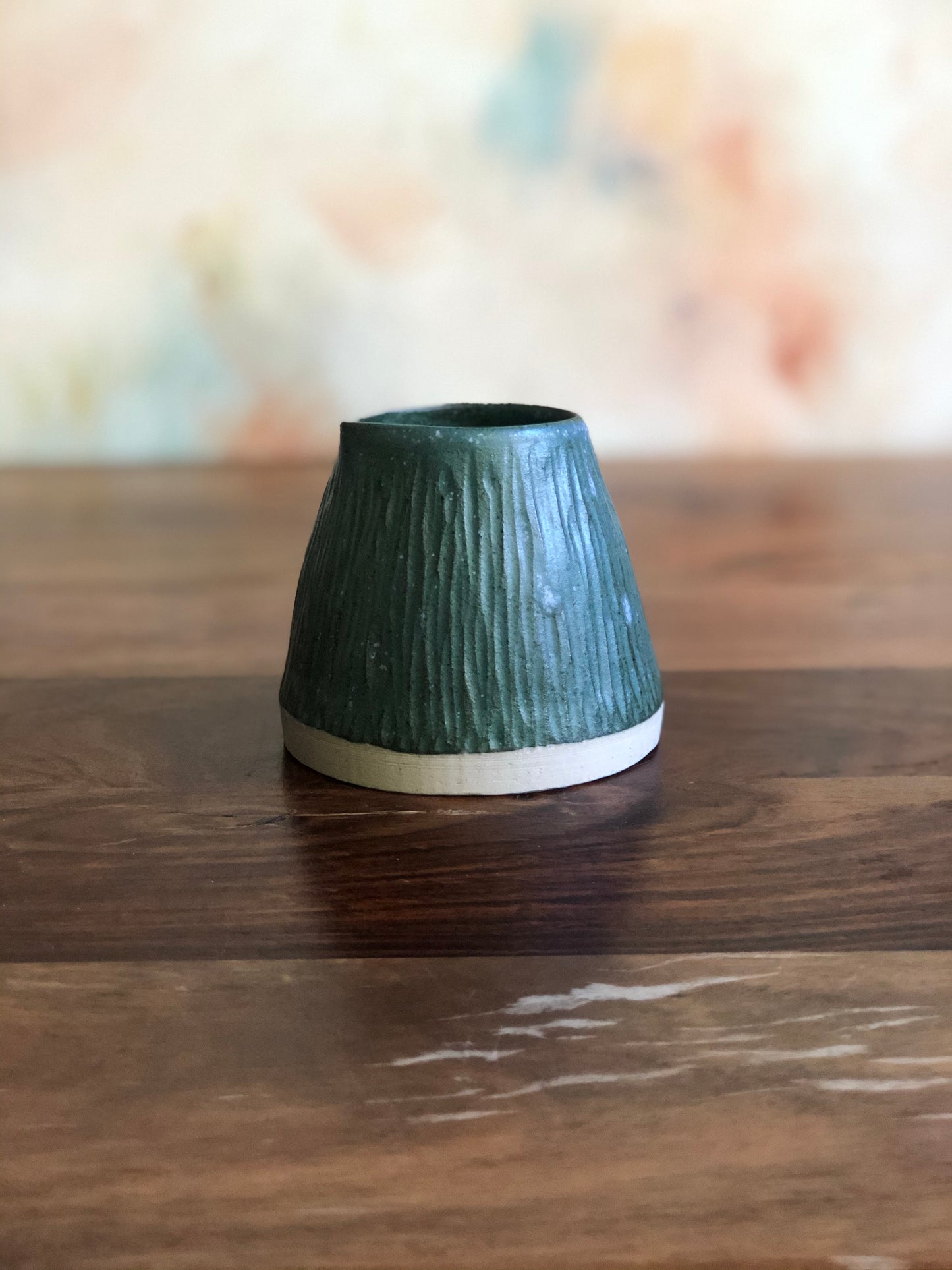Carved green conical pourer