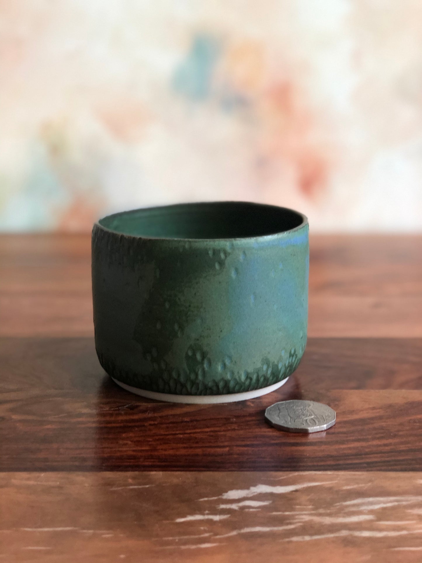 Carved green vessel