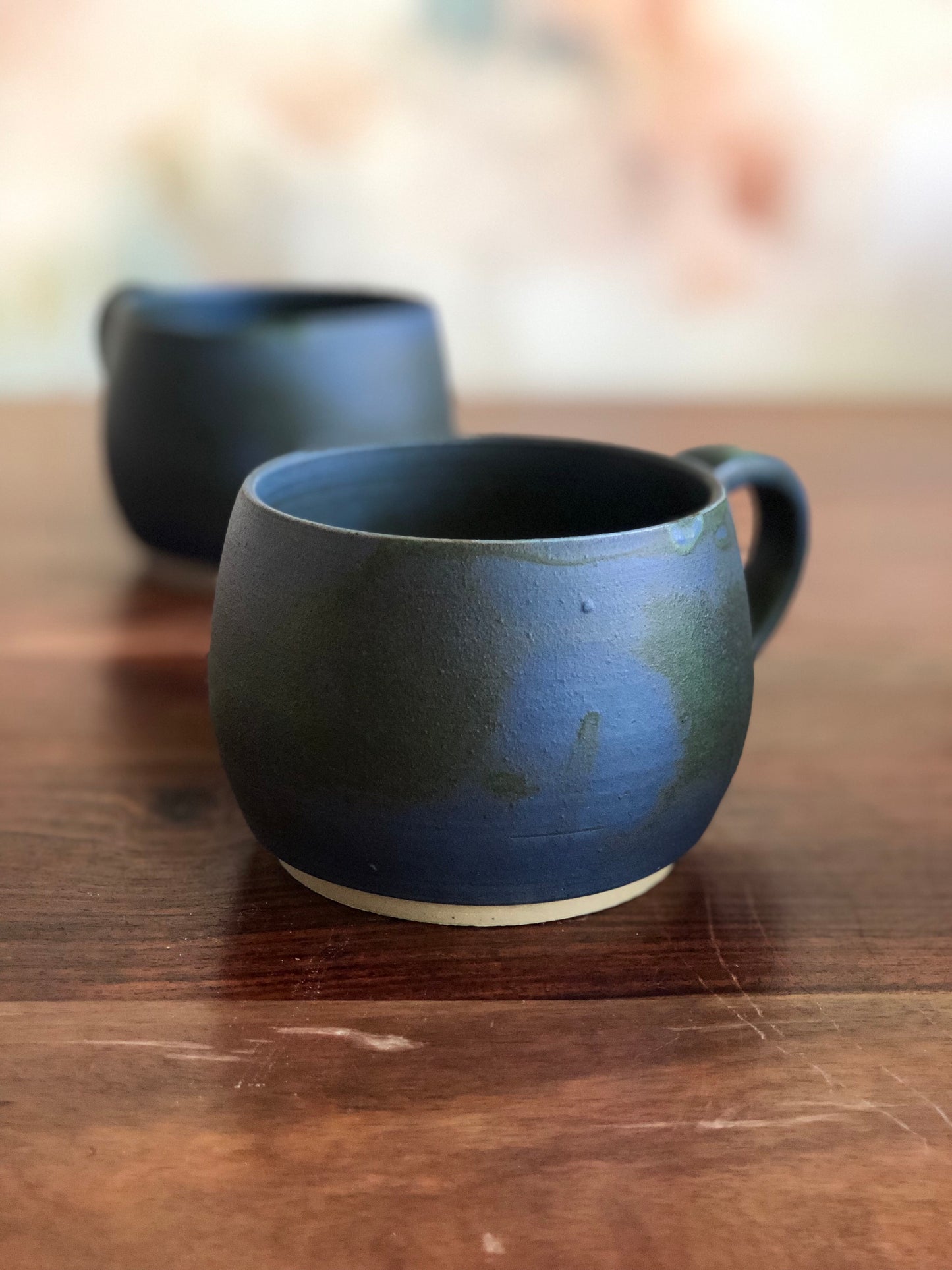 Matte green and blue round mugs