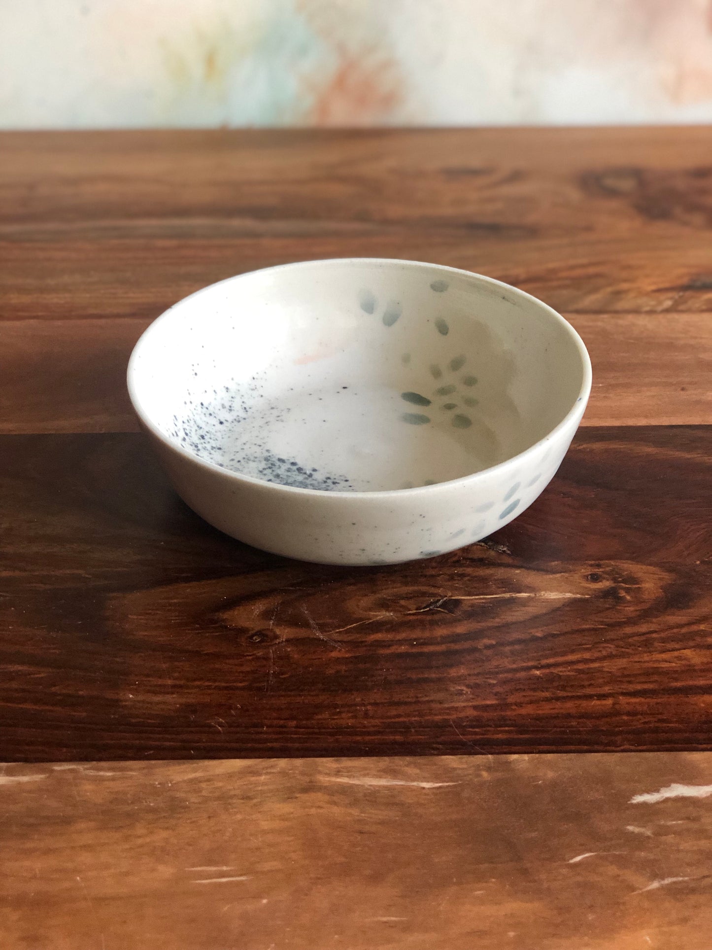 Green and grey painted shallow bowl