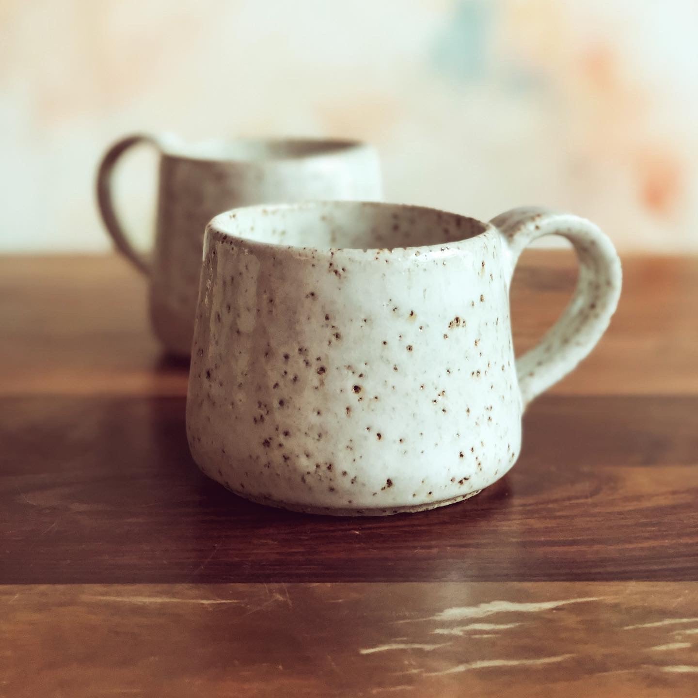 Speckled white gumnut mugs