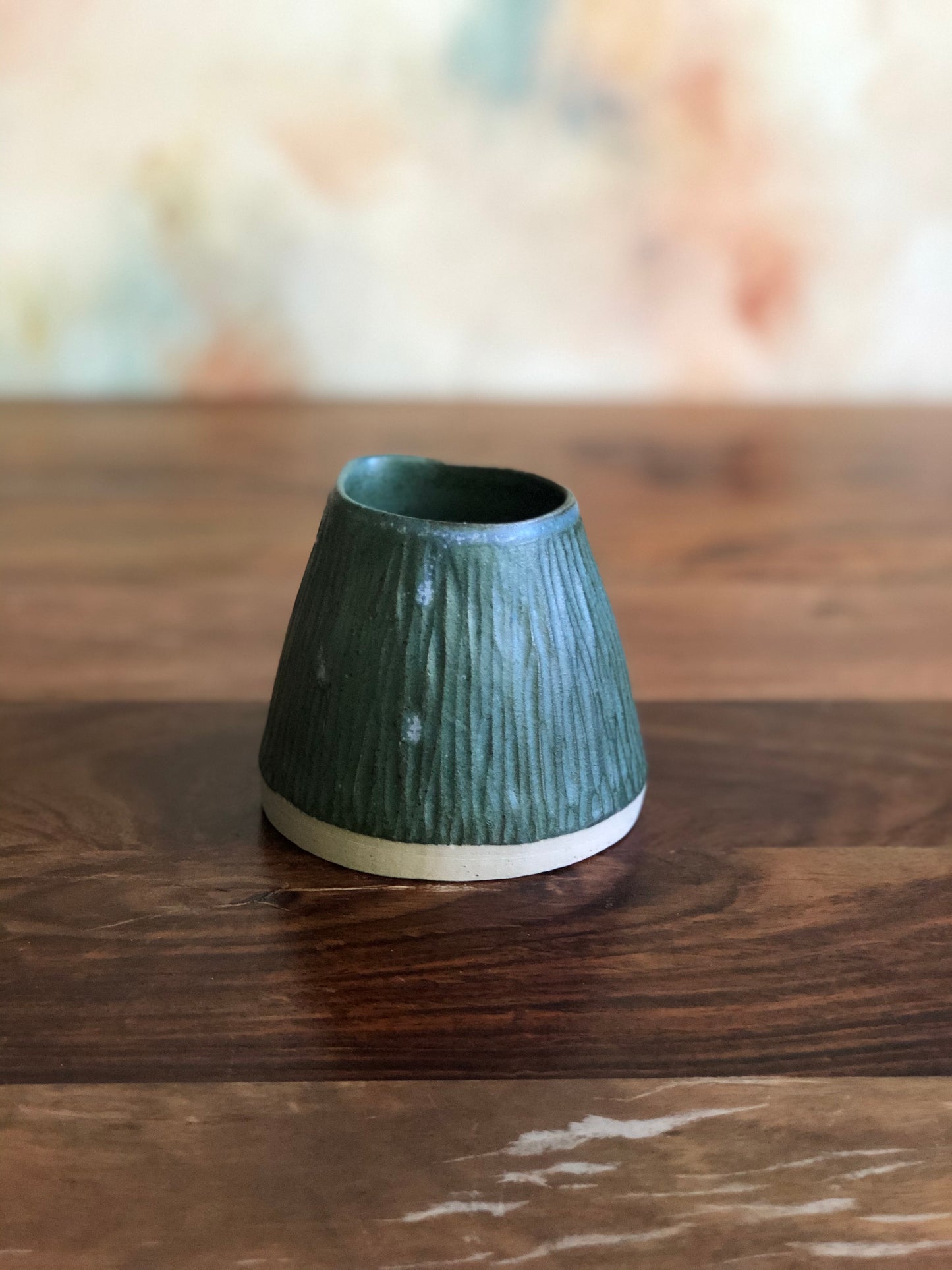 Carved green conical pourer