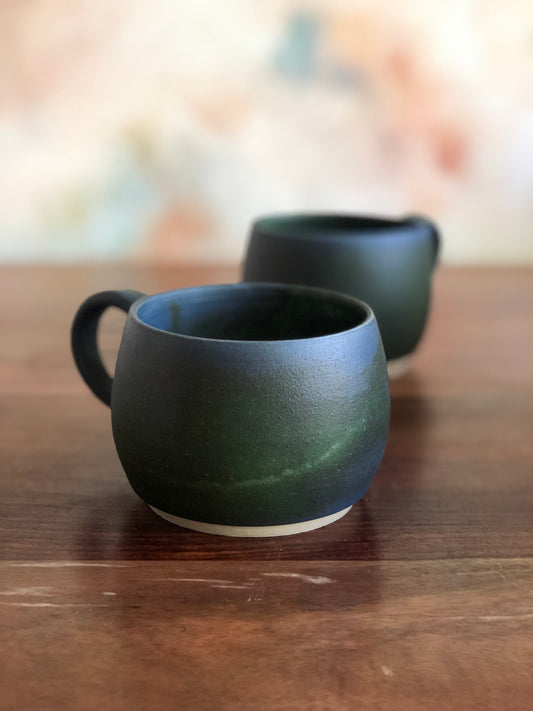 Matte green and blue round mugs